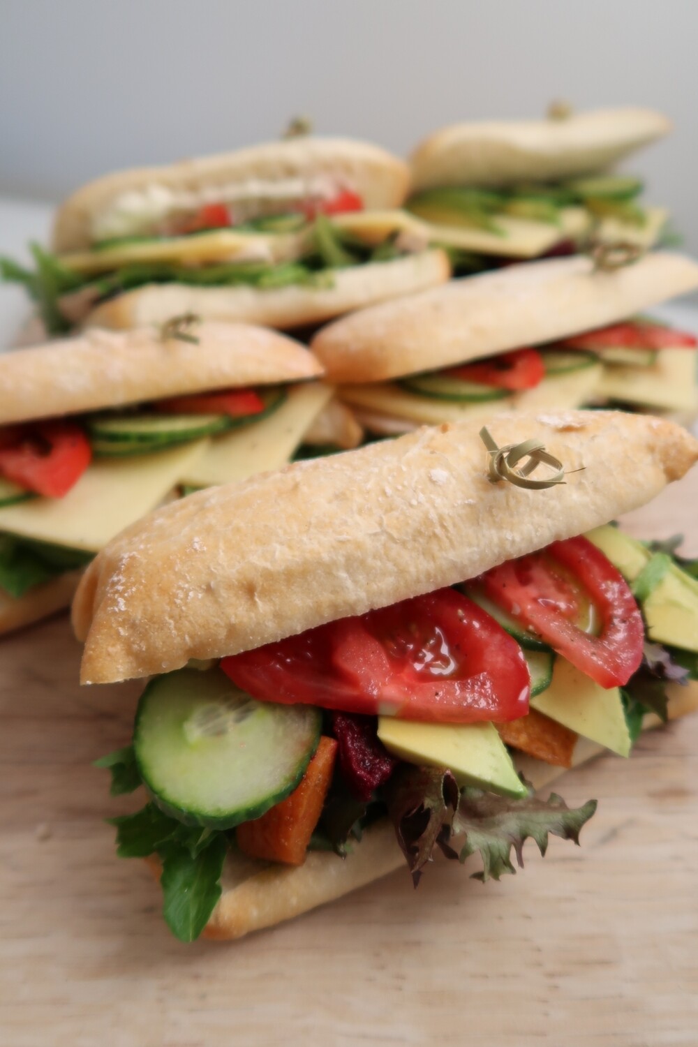 SANDWICH SUBSCRIPTION*: freshly baked Ciabata pocket filled with salad greens, cucumber, tomato and your choice spread and filling. *only available locally, see description