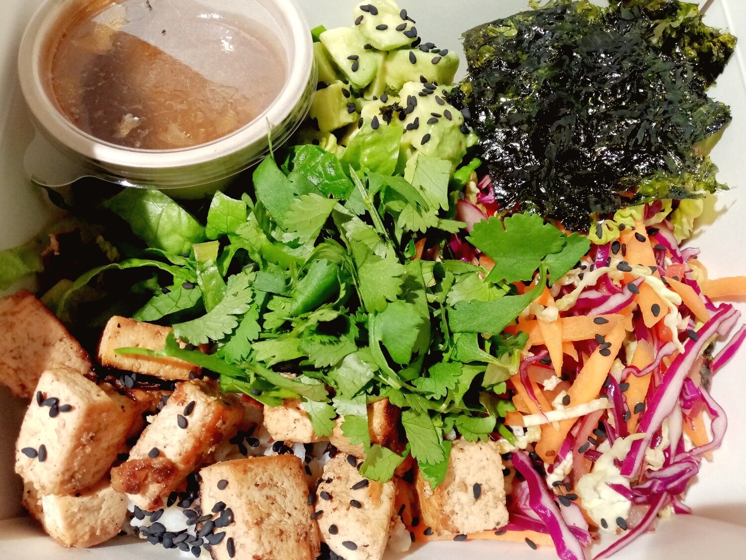 CHI BOX: Soba noodles, marinated red cabbage, cos lettuce, grated carrot, capsicum, avocado, panfried tofu, black sesame seeds, coriander. Your choice extras and vinnaigrette. DF