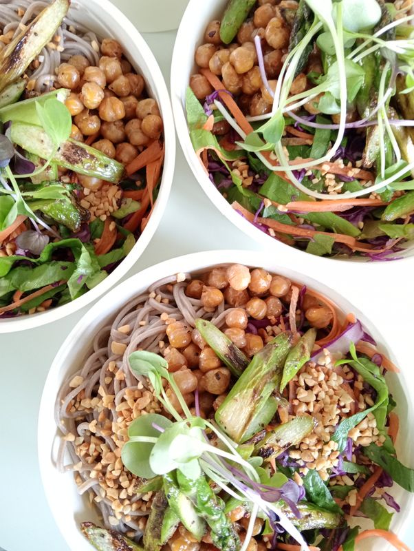 NOODLE BOWL Soba noodles. Carrots. Panfried Asparagus. Cos lettuce. Spring onions. Red cabbage. Honey roasted chickpeas. Toasted peanuts. Your Choice extras and vinnaigrette. GF available