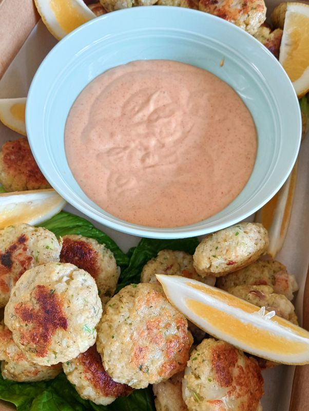 12x homemade fish, lemon and herb cakes with sriracha and smoked paprika and  lime mayonnaise