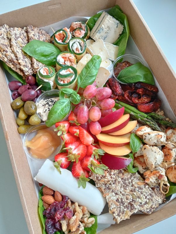 NO GRAINER PLATTER for 2-4 people with house made seed crackers, lemon and herb chicken skewers, smoked salmon courgette bites, cheeses, chutney, hummus, seasonal roast vegetables, fruit, pickles....