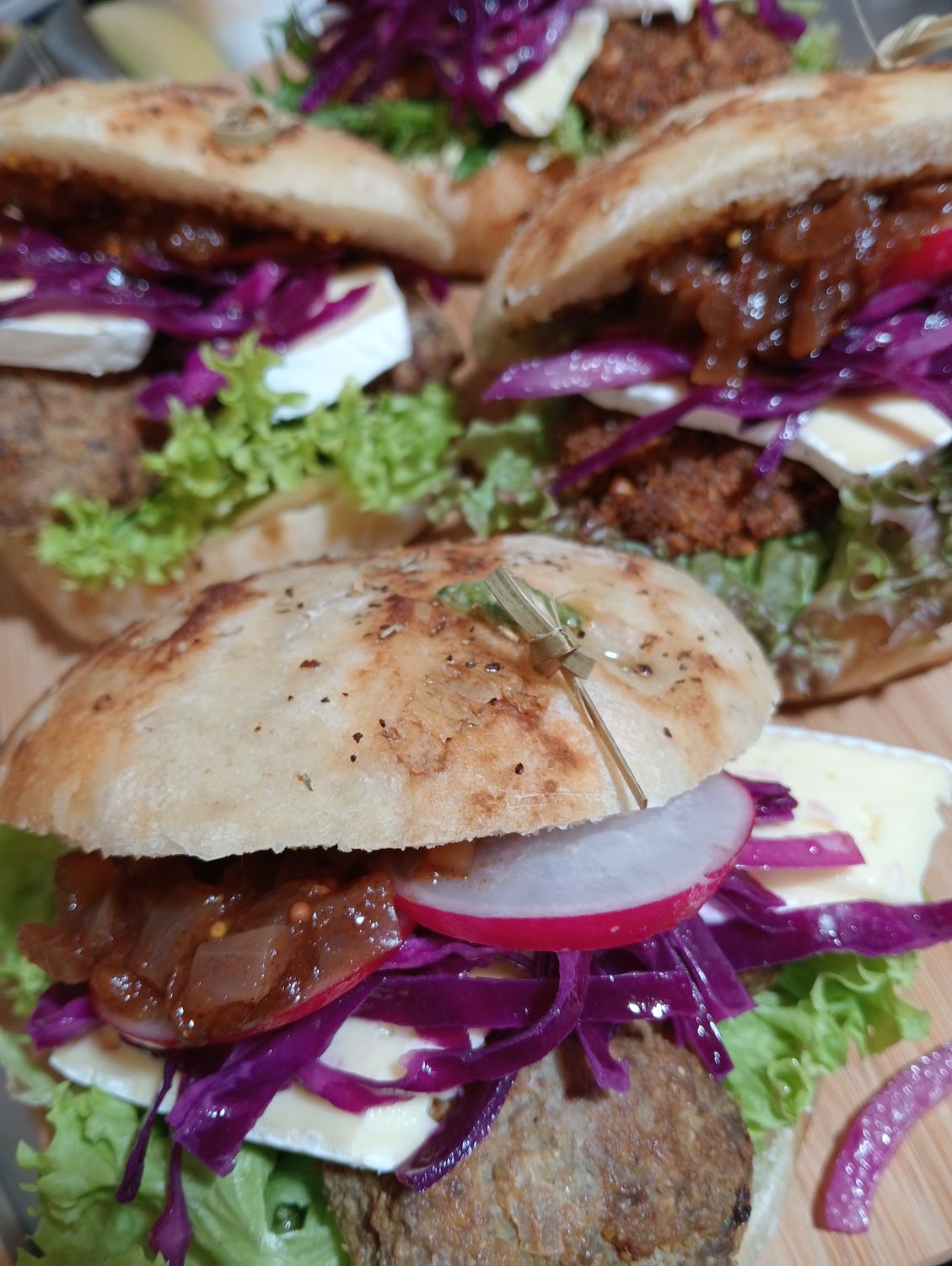 SOURDOUGH BUN with cream cheese, pesto, mustard, lettuce, homemade chutney, radish, gherkin, quick pickled red cabbage and red onion, Camembert. Choose from Falafel or Meatball.