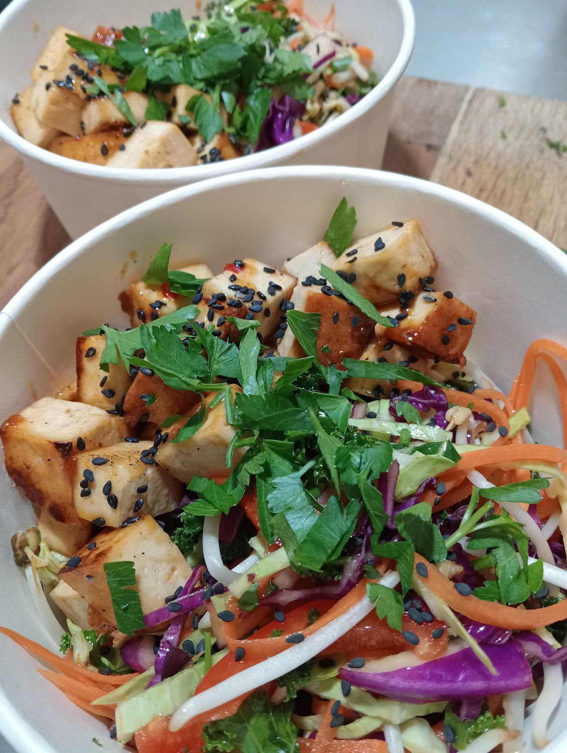 ASIA SLAW Red and green cabbage, carrot, spring onion, capsicum, broccoli, mung beans *, marinated in sesame oil, apple vinegar and soy sauce on rice noodles with sweet chilli tofu and sesame seeds.