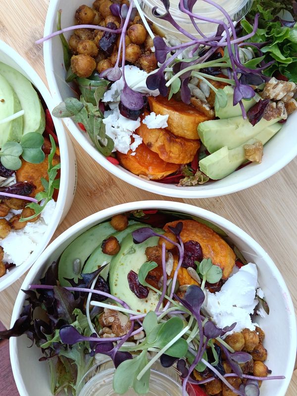 MINT BOWL Colorful rainbow salad with salad greens, chickpeas, panfried asparagus, sliced orange, feta, avocado, toasted seeds, walnuts and cranberries. Apple vinaigrette. GF MINT BOWL Colorful rainbow salad with salad greens, chickpeas, panfried asparagus, sliced orange, feta, avocado, toasted seeds, walnuts and cranberries. Apple vinaigrette. GF