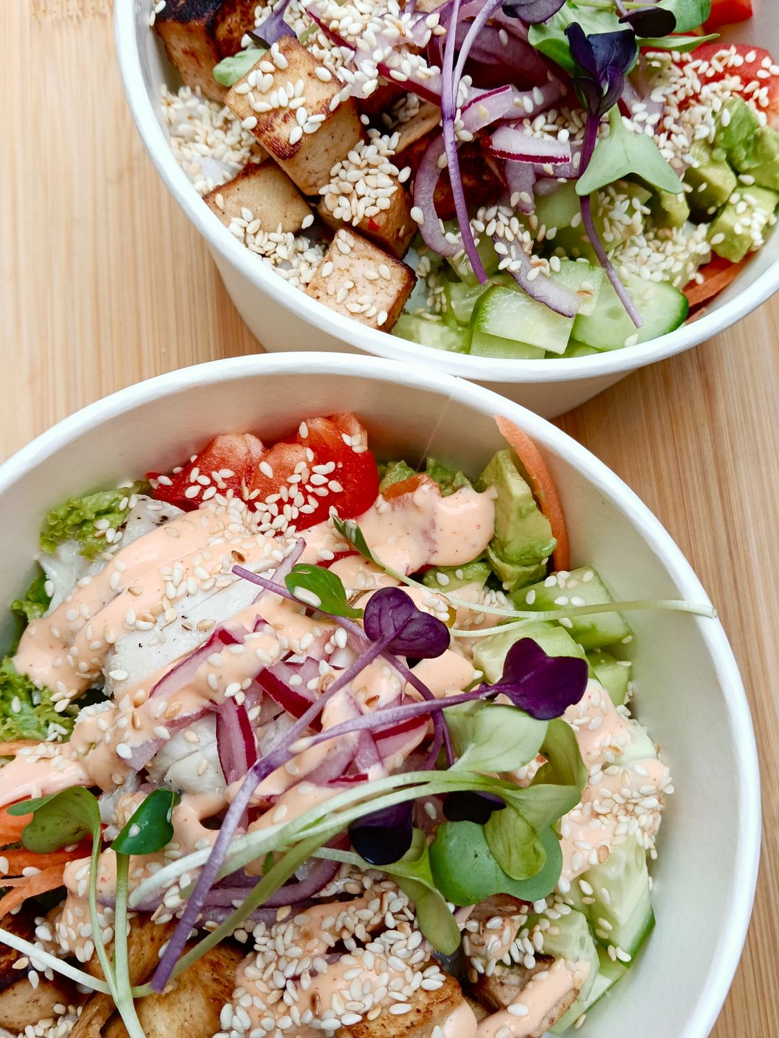 SUSHI BOWL. Sushi rice, cucumber, avocado, carrot, red cabbage, capsicum, quick pickled red onion, lettuce, toasted sesame, ginger-lime-panfried tofu. Sriracha mayo or asia vinaigrette. GF DF