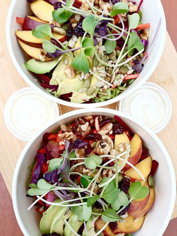MINT BOWL Salad greens with raw carrot, beetroot, celery, radish,  red cabbage, a seasonal fruit, toasted seeds, walnuts, dried cranberries, avocado and  apple-honey-mustard vinaigrette. GF