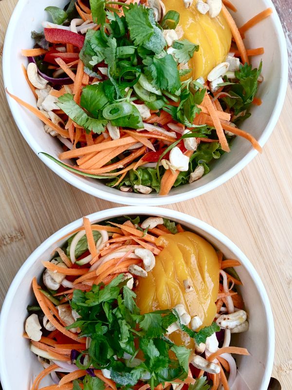 ASIA SALAD julienne carrots, red cabbage, mung beans*, spring onions, capsicum, salad greens, mint, coriander and mango* with toasted cashews and soy-sesame-lime-chillie vinaigrette. GF