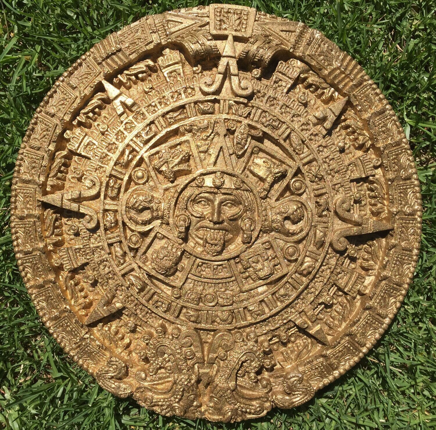 Ancient Aztec sun stone calendar, plaque art.
