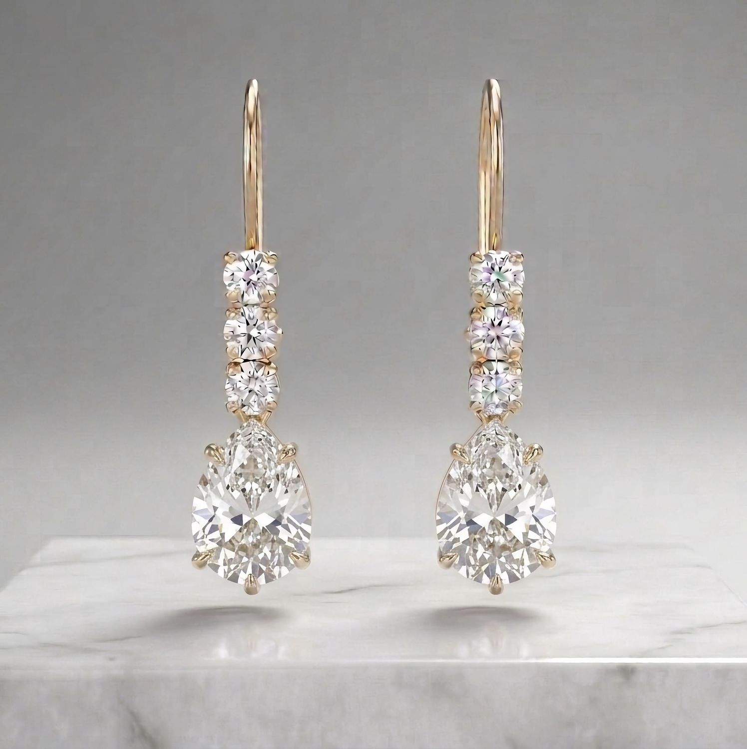 14kt 3 Stone Pear Shape Earrings (Diamond)