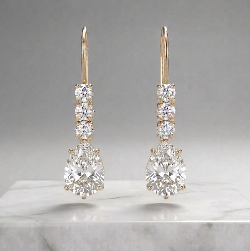 14kt 3 Stone Pear Shape Earrings (Diamond)