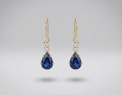 14kt Gold 3 Stone Pear Shape Earrings (Blue Topaz)