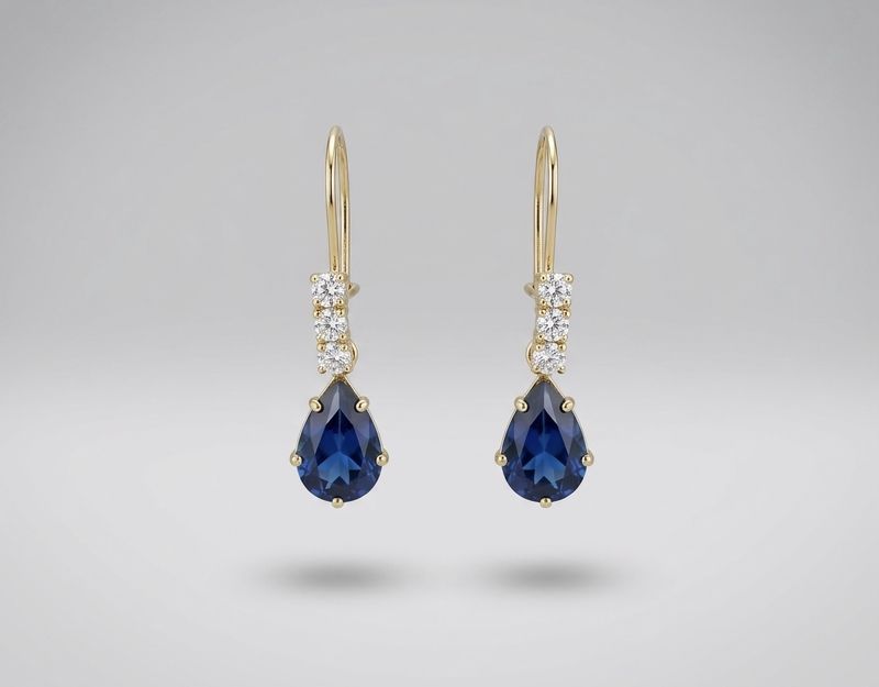 14kt Gold 3 Stone Pear Shape Earrings (Blue Topaz)