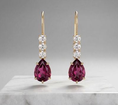14kt 3 Stone Pear Shape Earrings (Ruby)