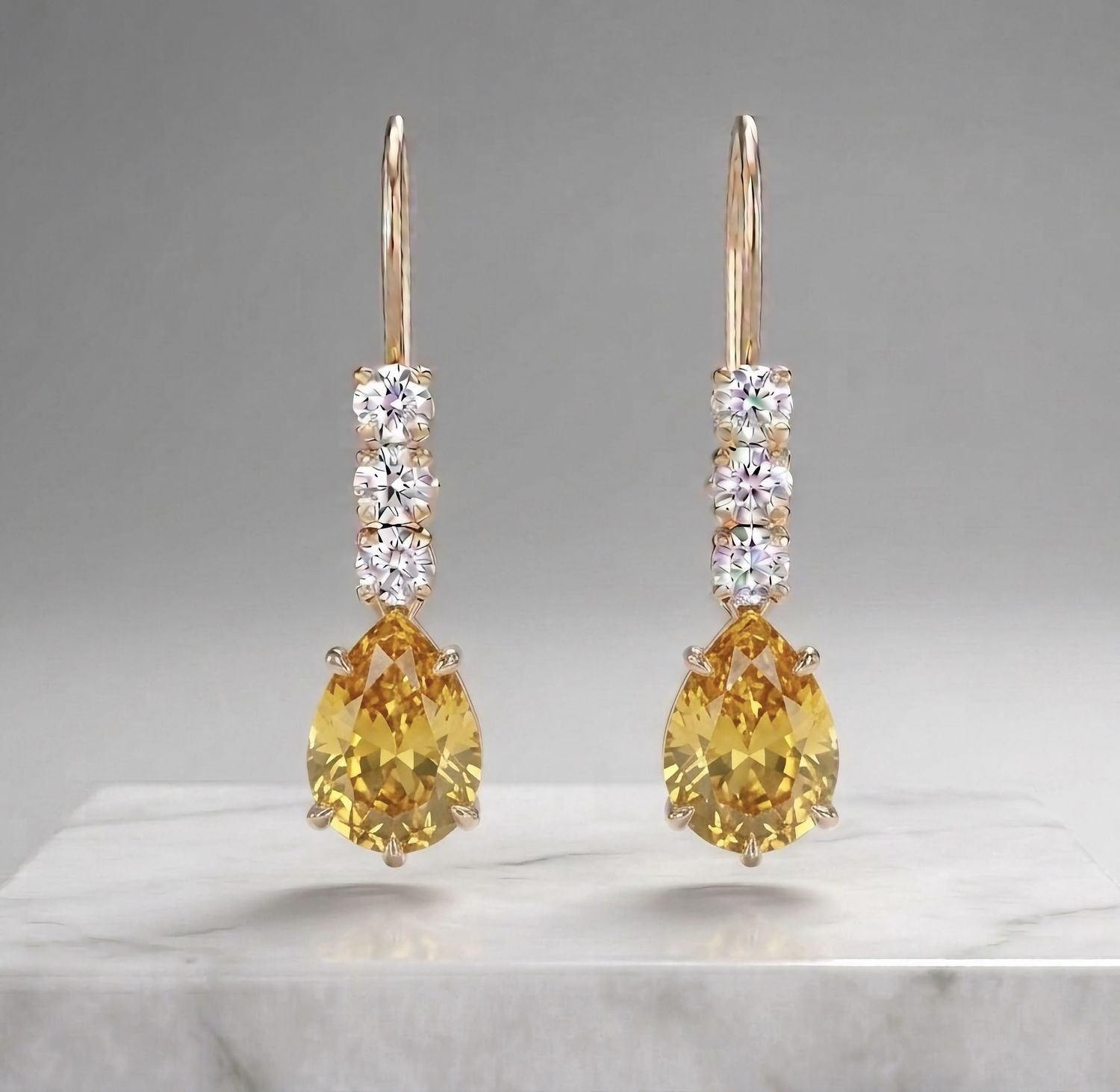 14Kt Gold 3 Stone Pear Shape Earrings (Topaz)