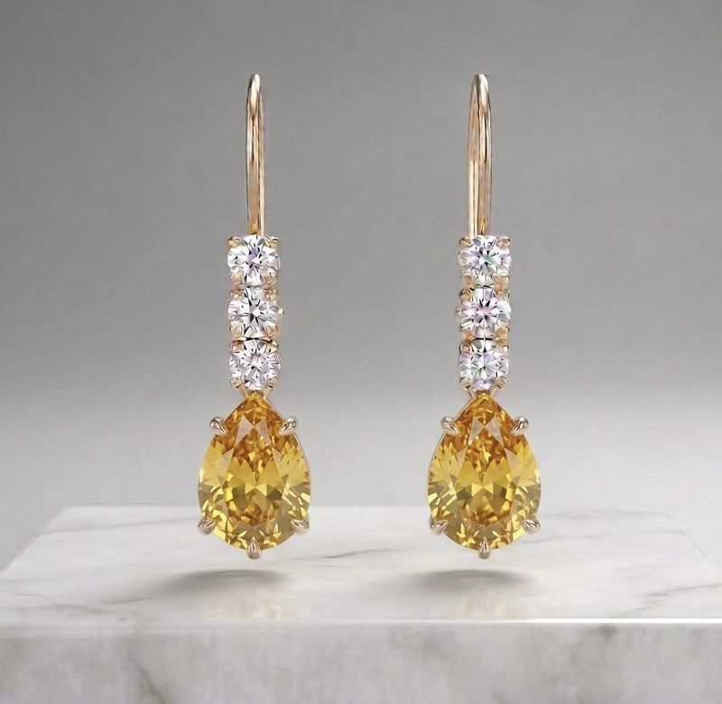 14Kt Gold 3 Stone Pear Shape Earrings (Topaz)