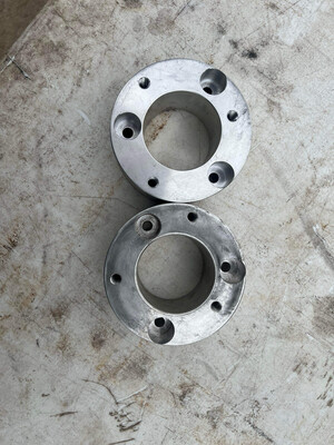 03+ Strut Risers