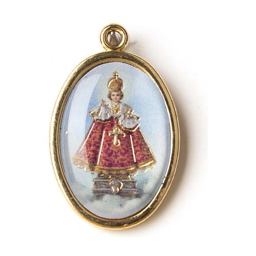 INFANT OF PRAGUE GILT MEDAL