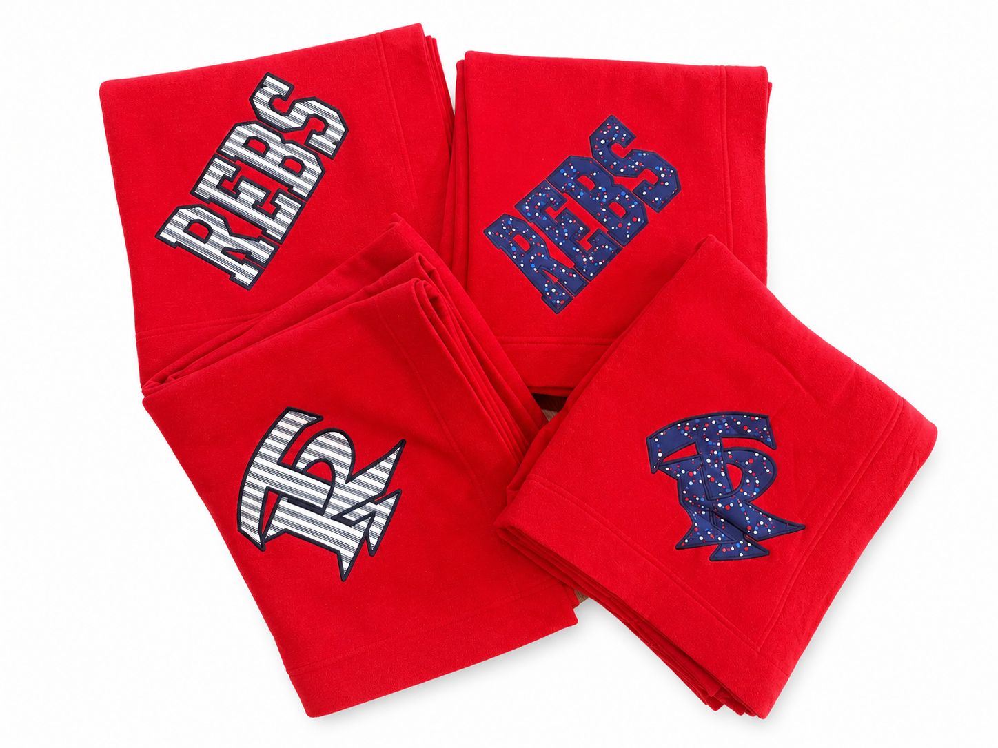Red appliqué blankets