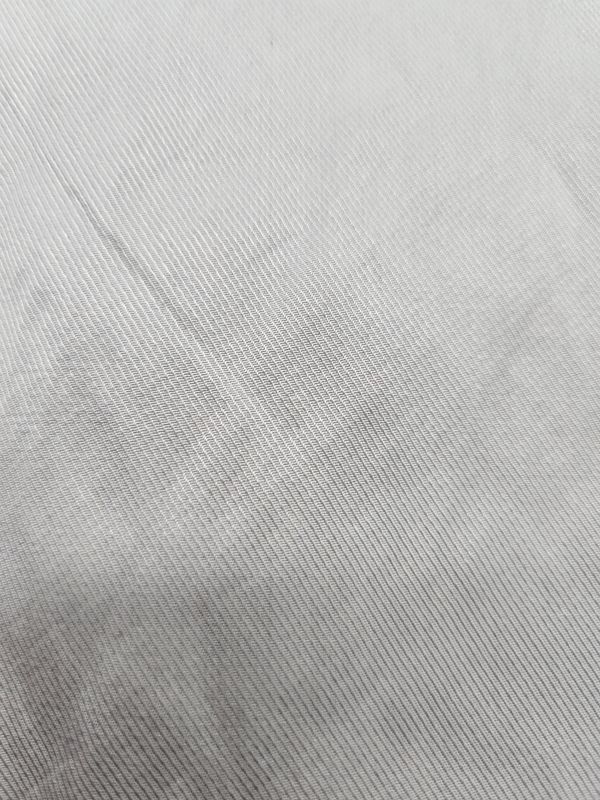 Light Grey Remnant with some Shine 3.5m x 140cm Woven Fabric TOTAL