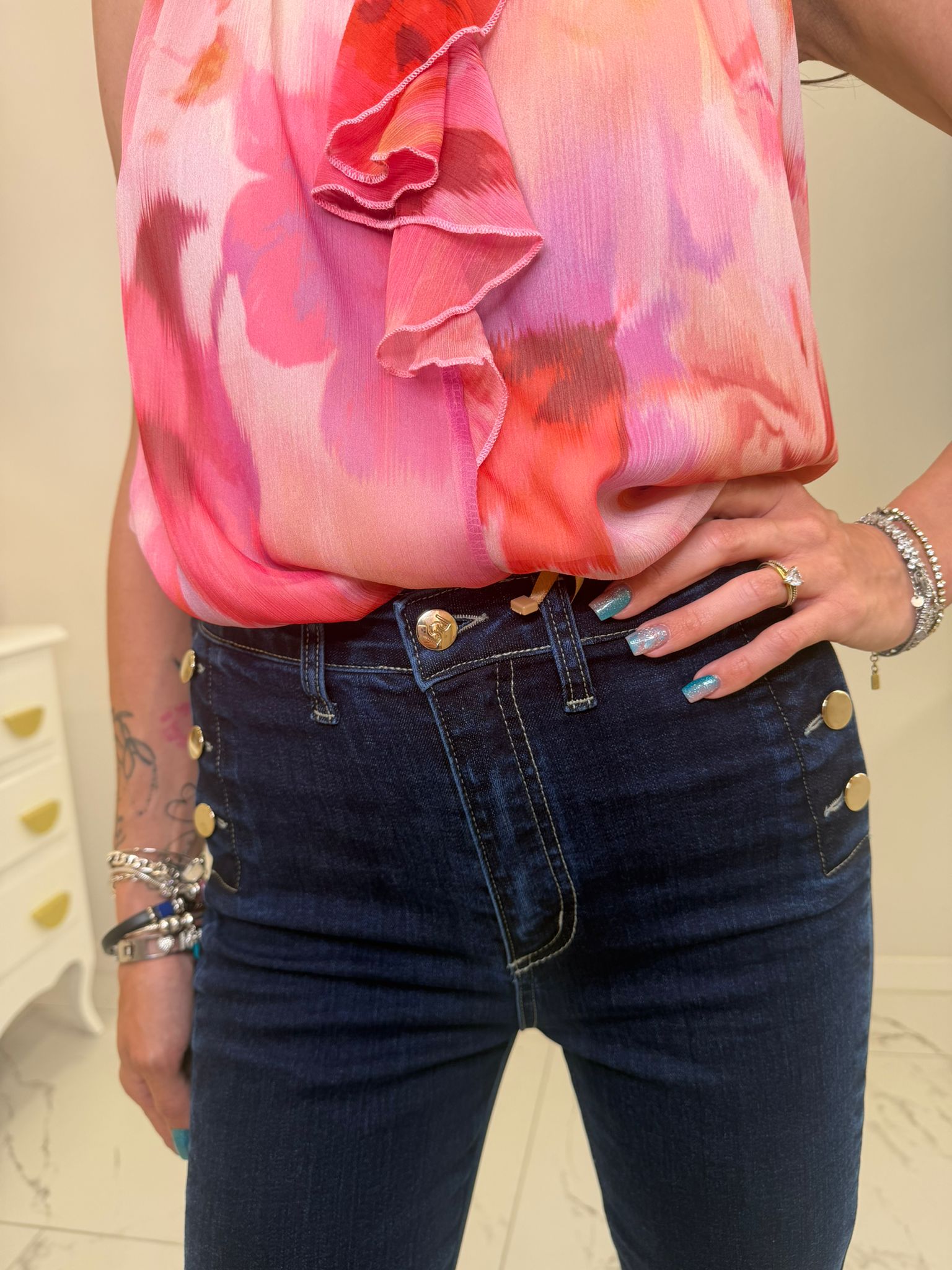 Jeans a zampa con bottoni,Rinascimento.