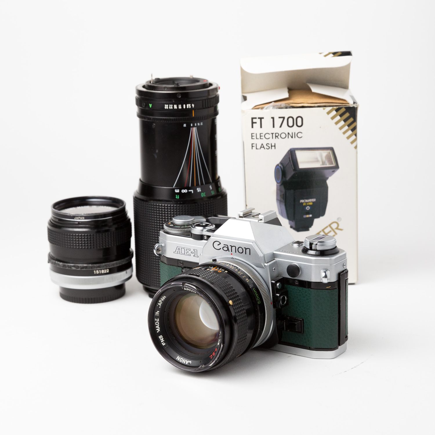 Canon AE-1  w/ 50mm, 28mm, and 70-210mm lenses, and flash!