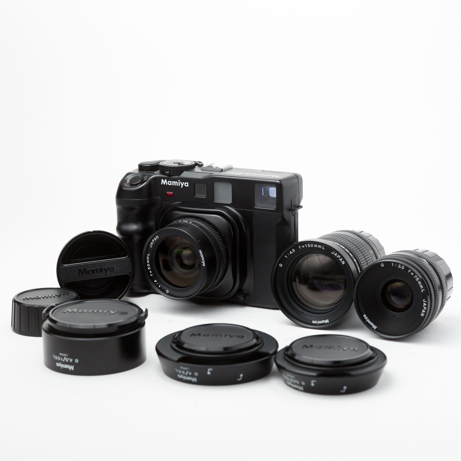 Mamiya 6 MF w/ 50mm f/4, 75mm f/3.5, 150mm f/4.5 lenses, and lens hoods