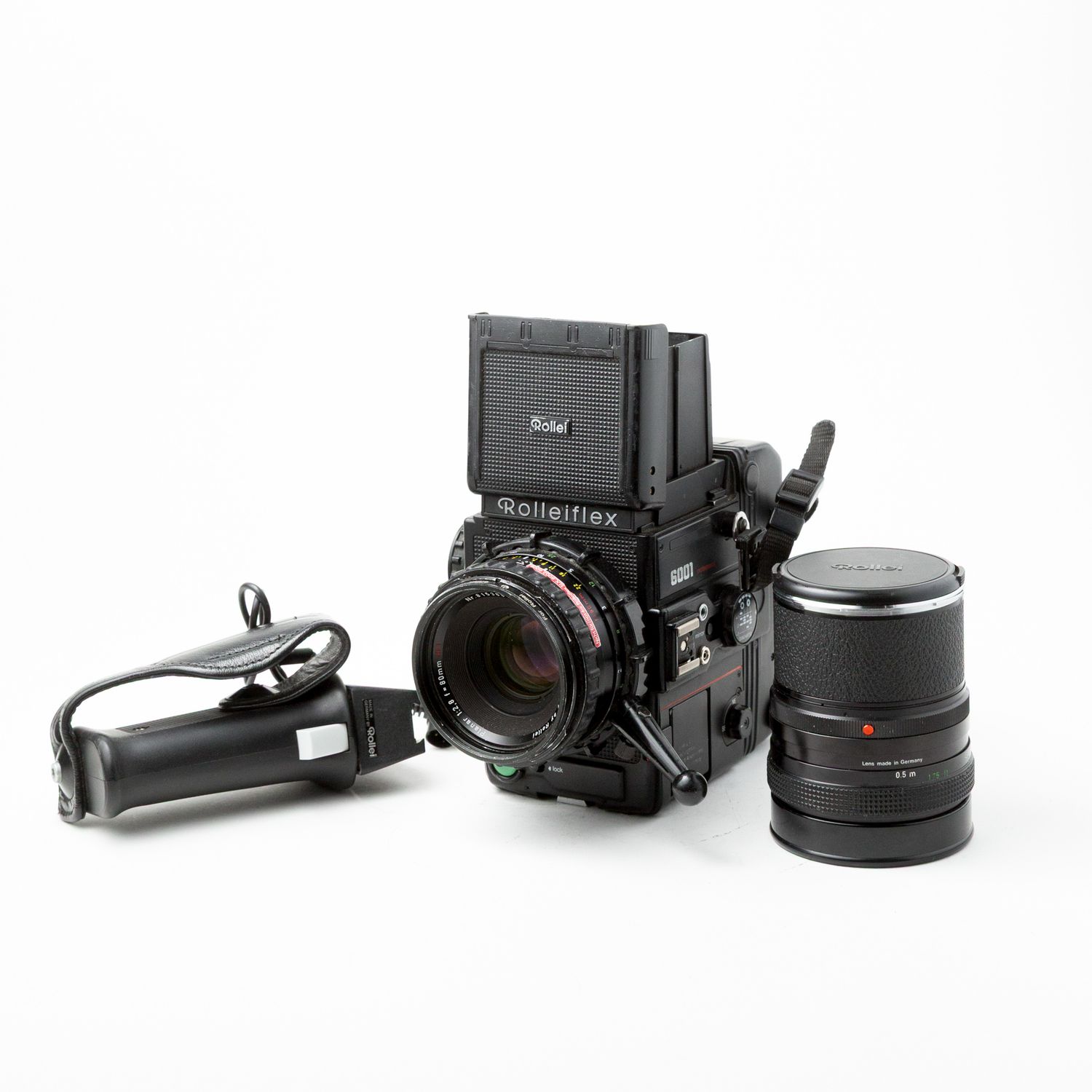 Rollei 6001 w/80mm f/2.8, 50mm f/4 lenses, spare battery, spare magazine, and pistol grip