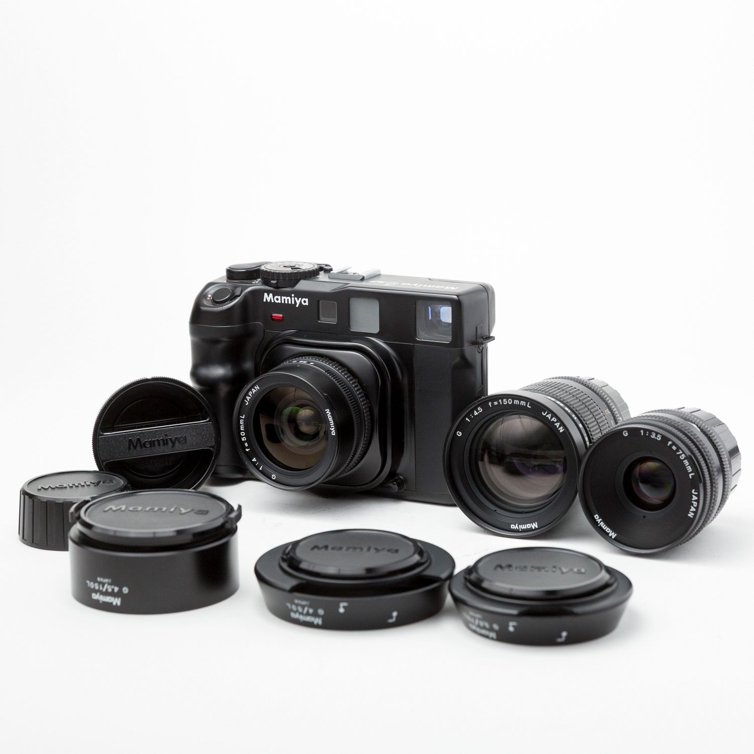Mamiya 6 MF w/ 50mm f/4, 75mm f/3.5, 150mm f/4.5 lenses, and lens hoods