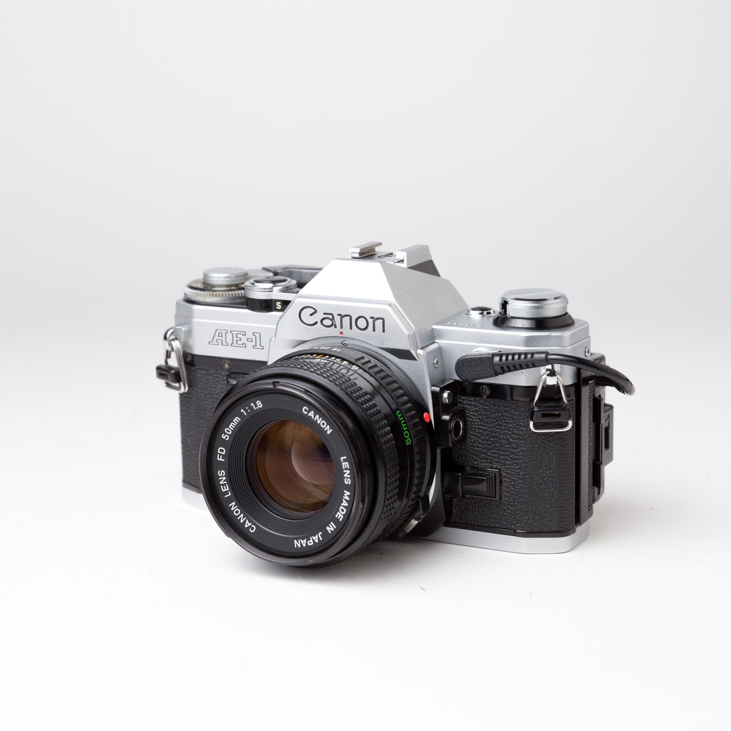 Canon AE-1  w/ 50mm f/1.8 lens and Data Back