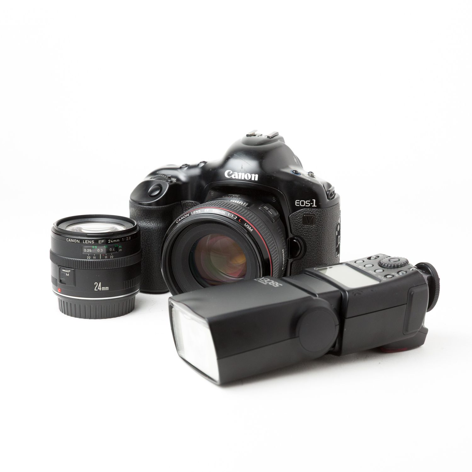 Canon EOS-1V w/ EF 50mm f/1.2, EF 24mm 2.8 Lenses, and 580EX Flash