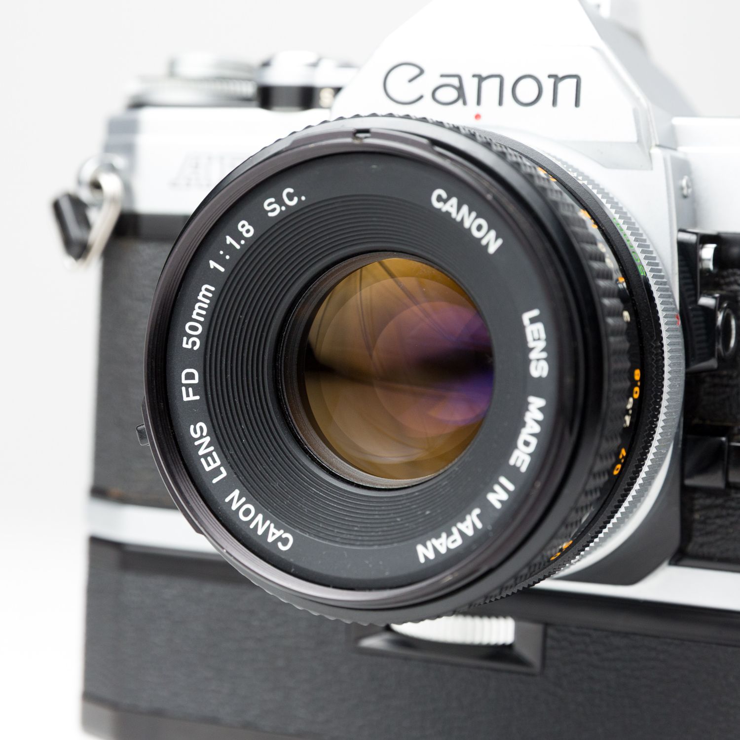 Canon AE-1 w/ 50mm f/1.8 lens, and Auto Winder