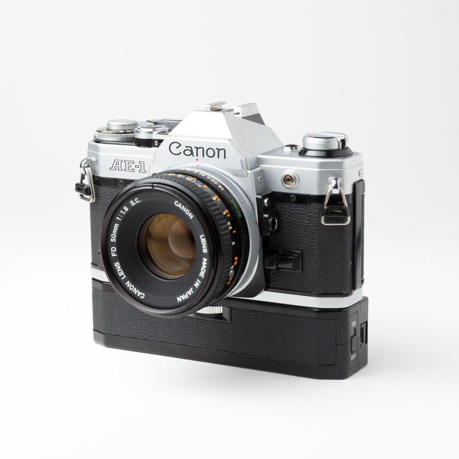 Canon AE-1 w/ 50mm f/1.8 lens, and Auto Winder