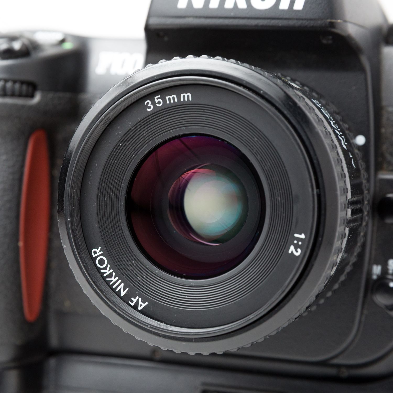 Nikon F100 w/ AF Nikkor 35mm f/2 lens + battery pack