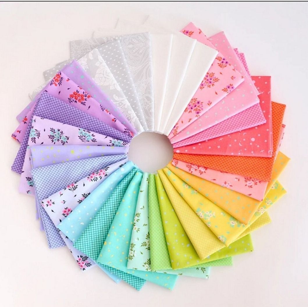 NEW True Colors by Tula Pink 56pc 10" x 10" square pack Available May 2025