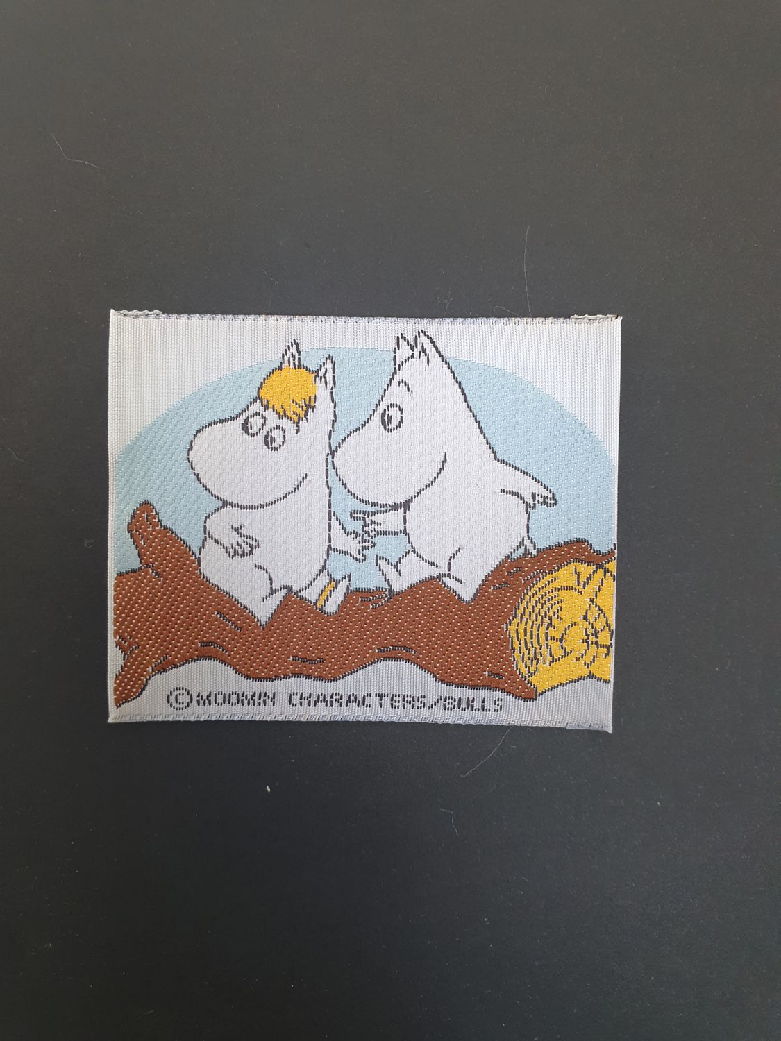 Naszywka Muminek i Migotka na kłodzie '90