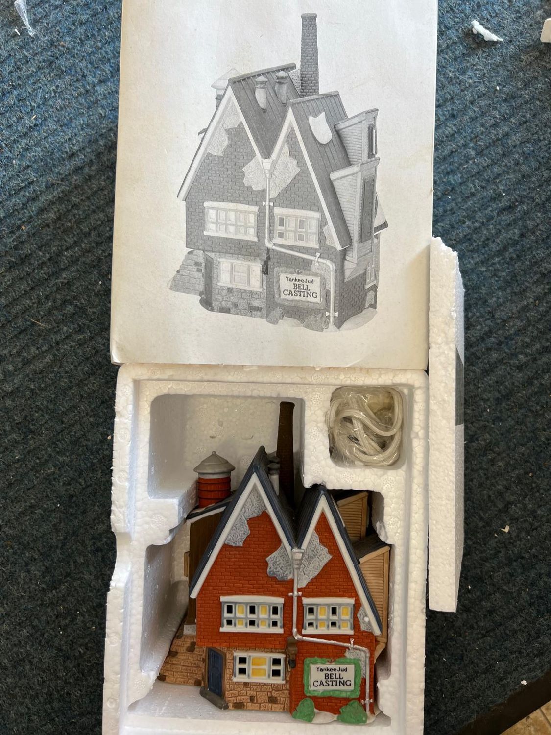 Dept 56 Yankee Jud Bell Casting 1992 (very small chip on snow left side)