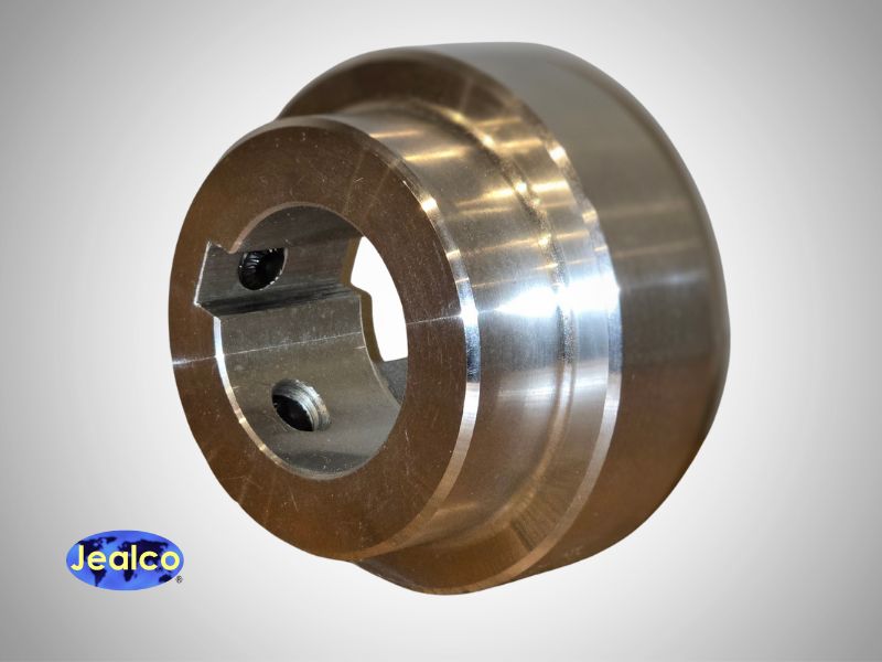 Reuland Flexible Coupling Front Half on Light Background with Jealco Logo