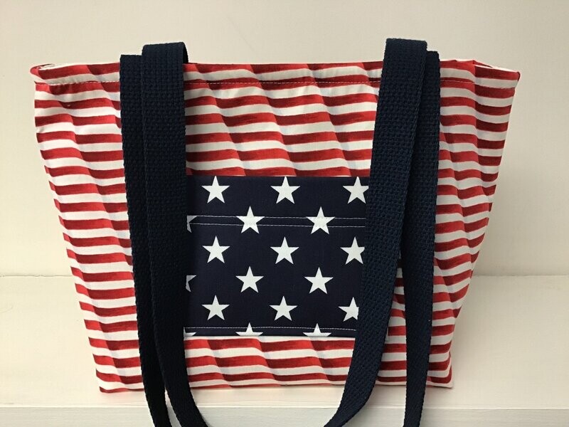 Fluttering red & white stripes with stars on navy pocket, dark navy straps