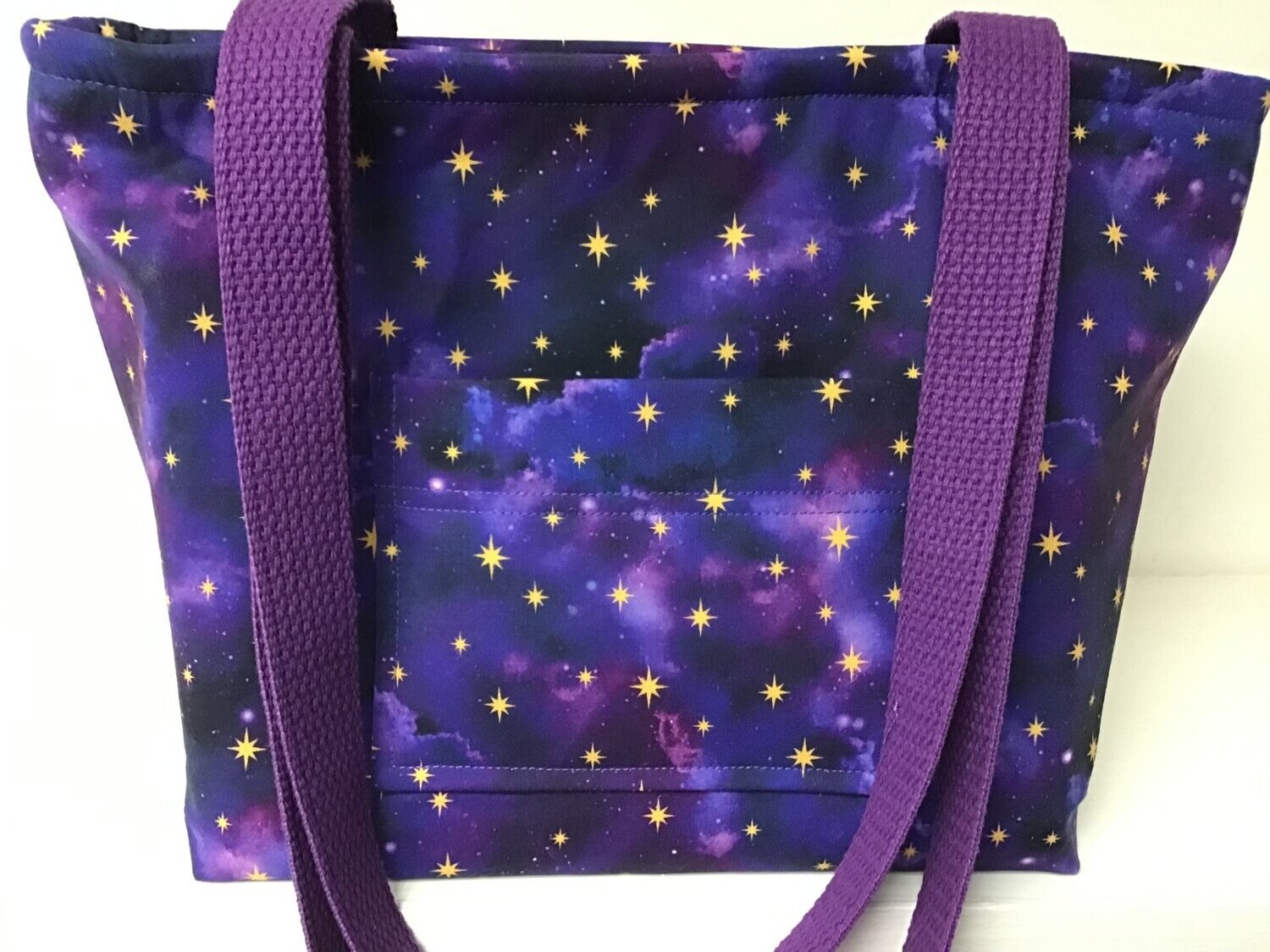 Stars in a purple and blue night sky, purple straps