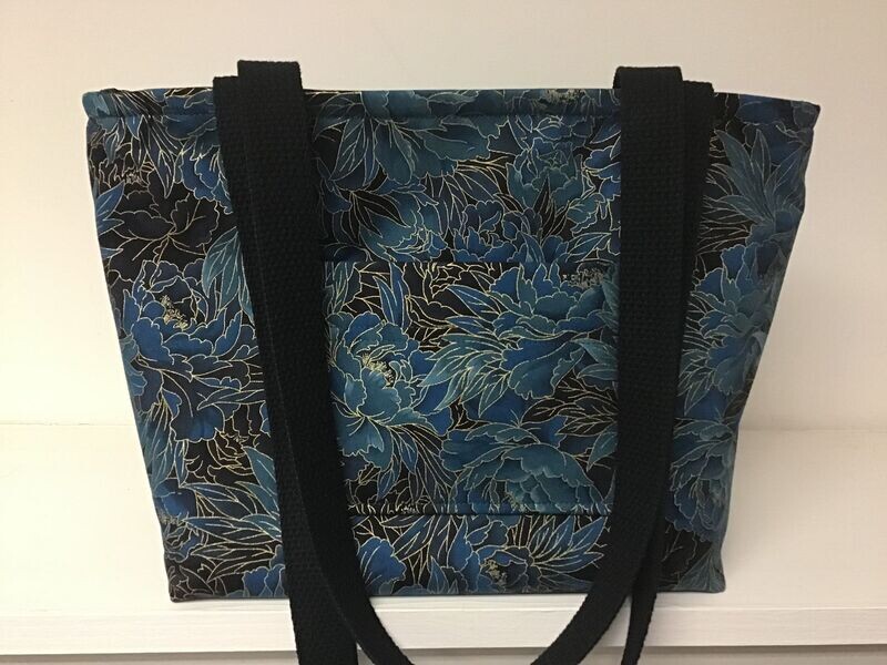 Rich marine blue tones in an elegant floral print, outlined in gold on black, black straps