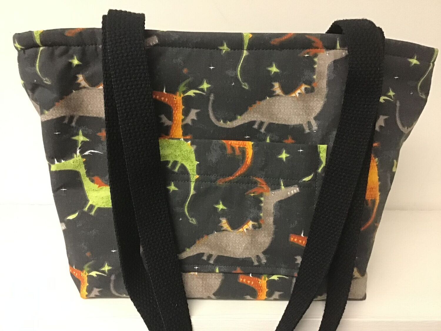 Dragons on a charcoal sky, black straps