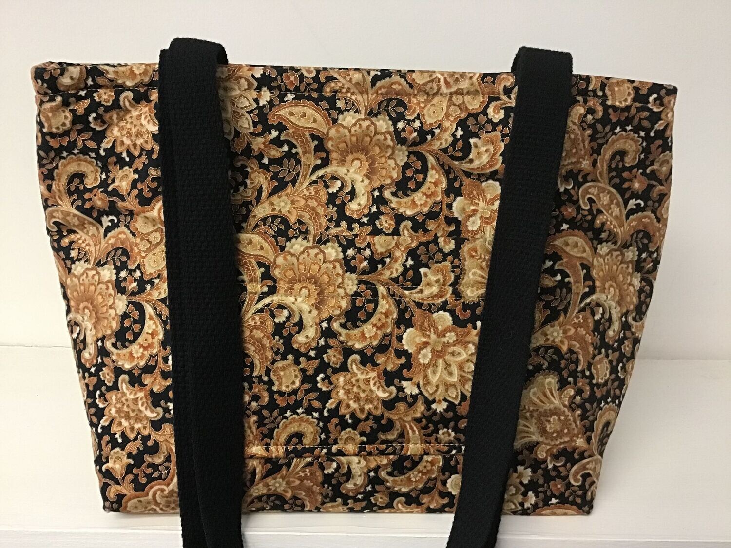 Rich gold and black paisley, black straps