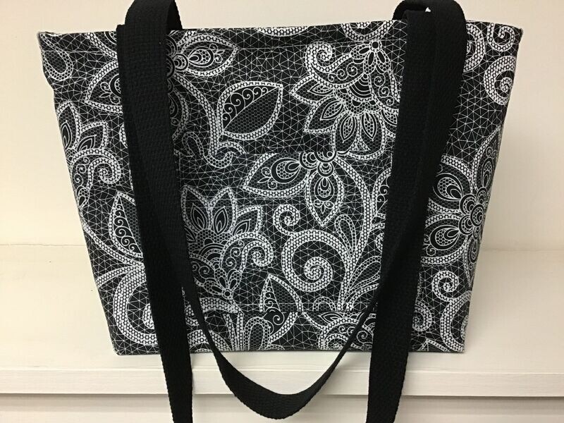 Elegant white on jet black floral print, black straps