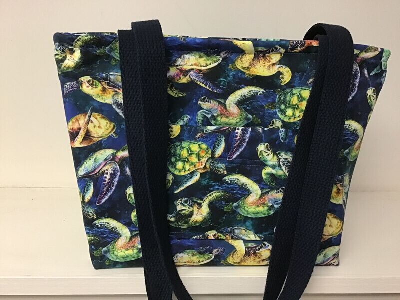 Sea turtles in the deep blue sea, dark blue straps