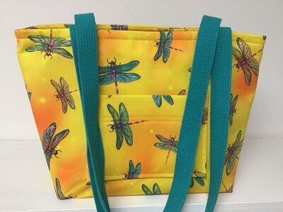 Multicolored dragonflies on bright yellow, teal green straps