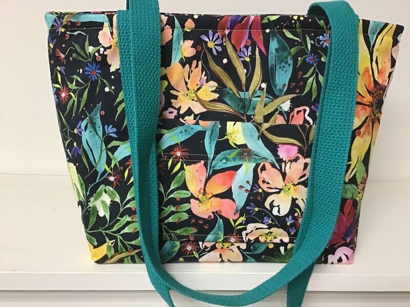bright garden flowers on deep blue/black, teal straps