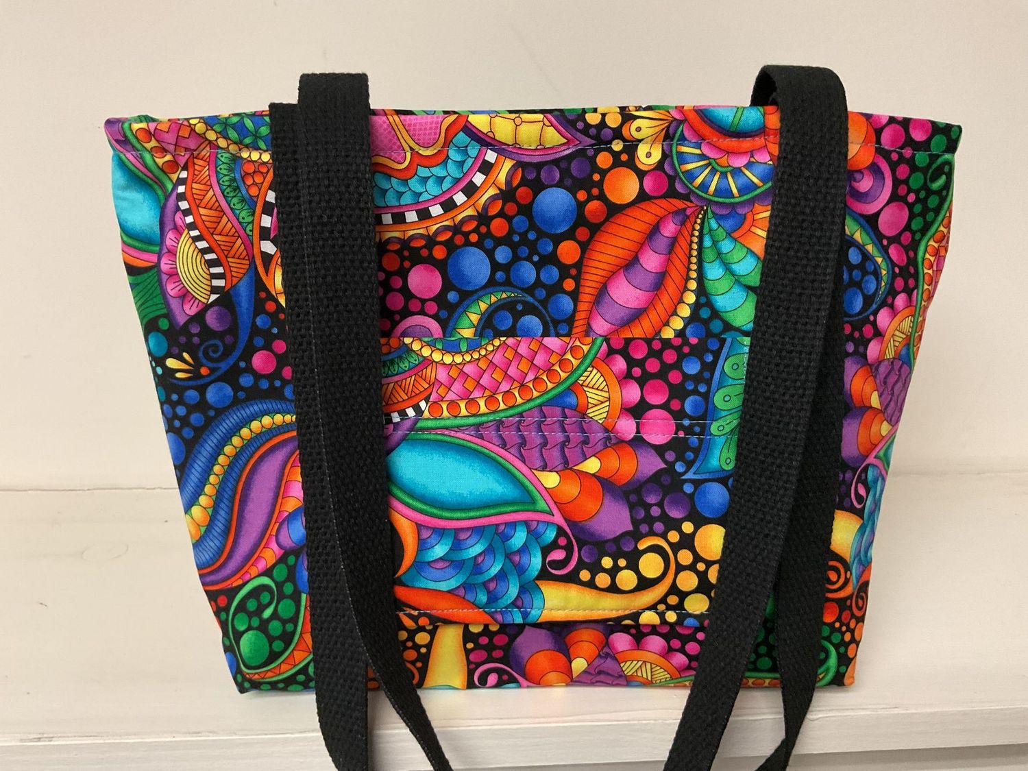 Bright zentangle design, black straps