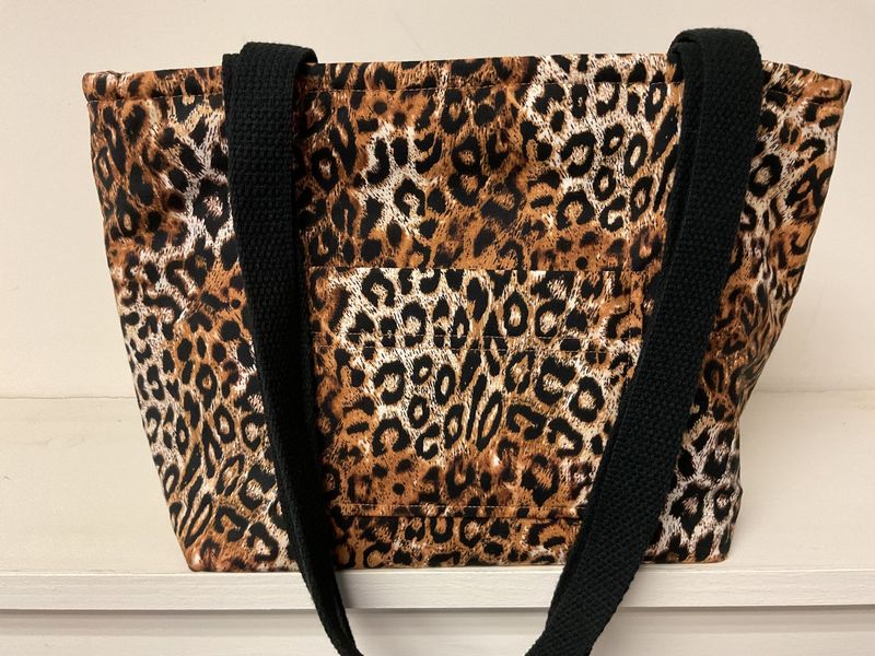 Leopard print, black straps
