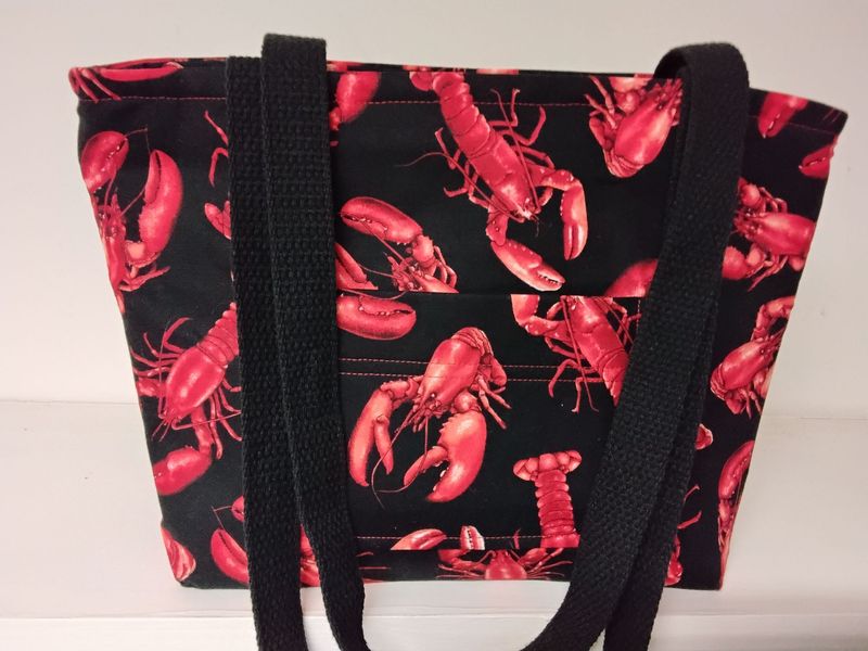 Lobsters on black, black straps Lobsters on black, black straps