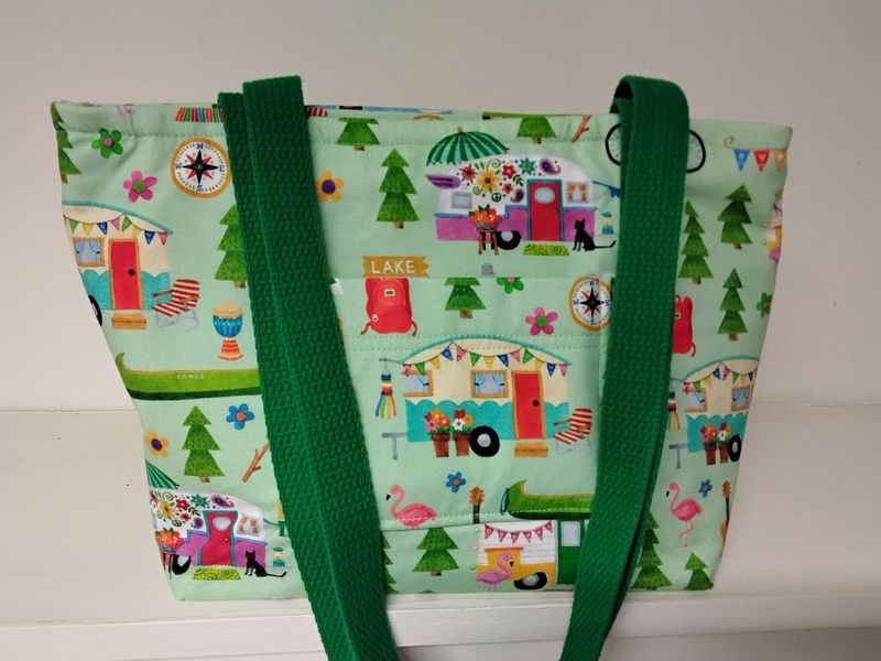 Cheerful camper print, green straps Cheerful camper print, green straps